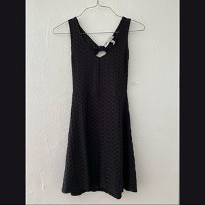 Sleeveless open back black dress
